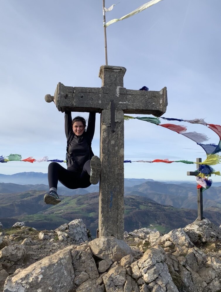 Alicia at a mountain summit in the Basque Country